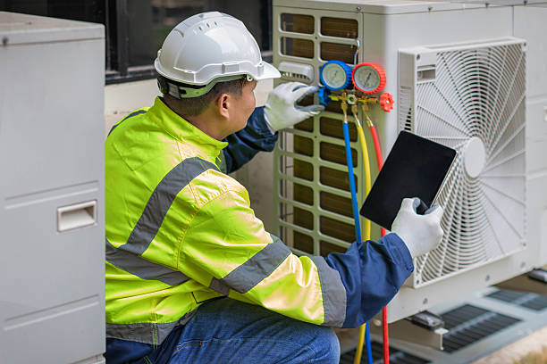 Professional Air Conditioning Repair technician working in Trimble, OH